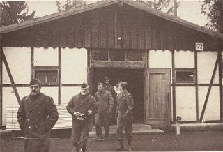 American soldiers finish their inspection of Dachau's first crematorium. Dachau, Germany, November 18, 1945